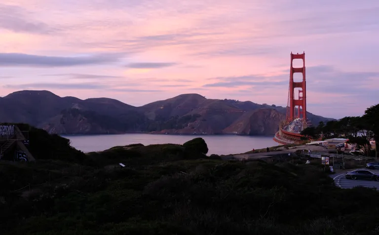 A sunset view of Marin Headlands and the Golden Gate Bridge