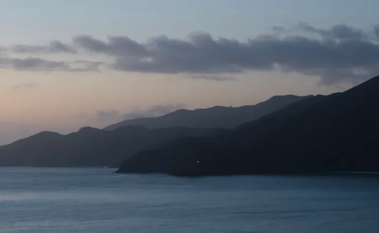 The layers of the Marin Headlands in dim light across the Pacific
