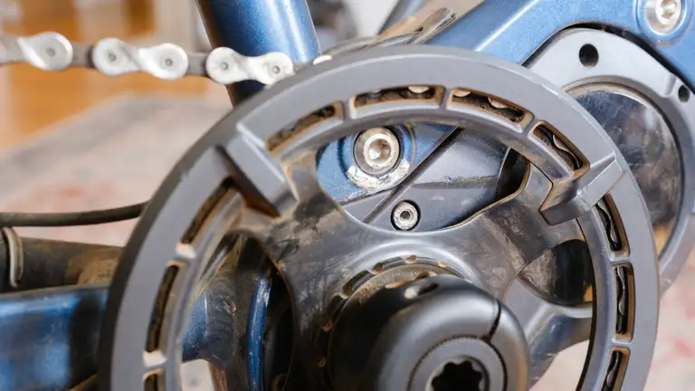 The front of a 1x crankset with the chain case fixing mounts visible