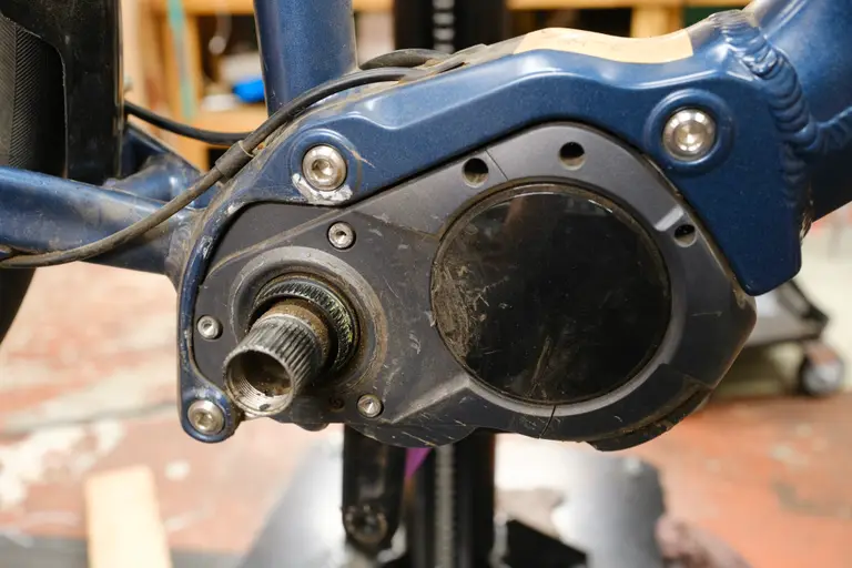 An e-bike mid-drive motor with the spindle and chainring splines empty