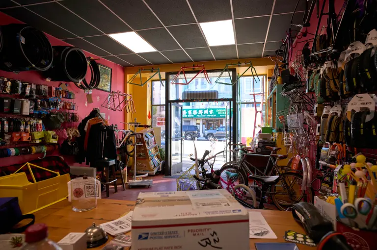 Looking out at the bike shop from behind the counter