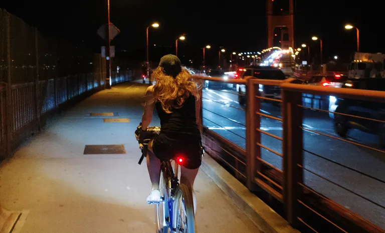 Kat riding back on the east sidewalk of the Golden Gate Bridge